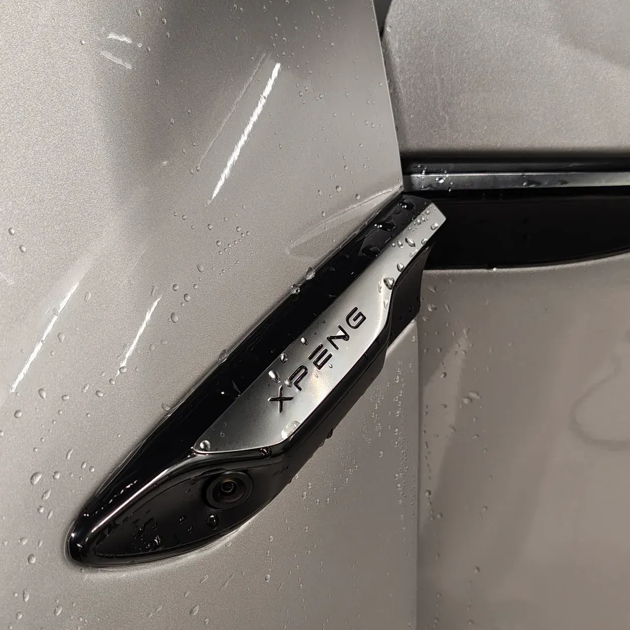 Water beading on XPENG paint protected with Zivent PPF